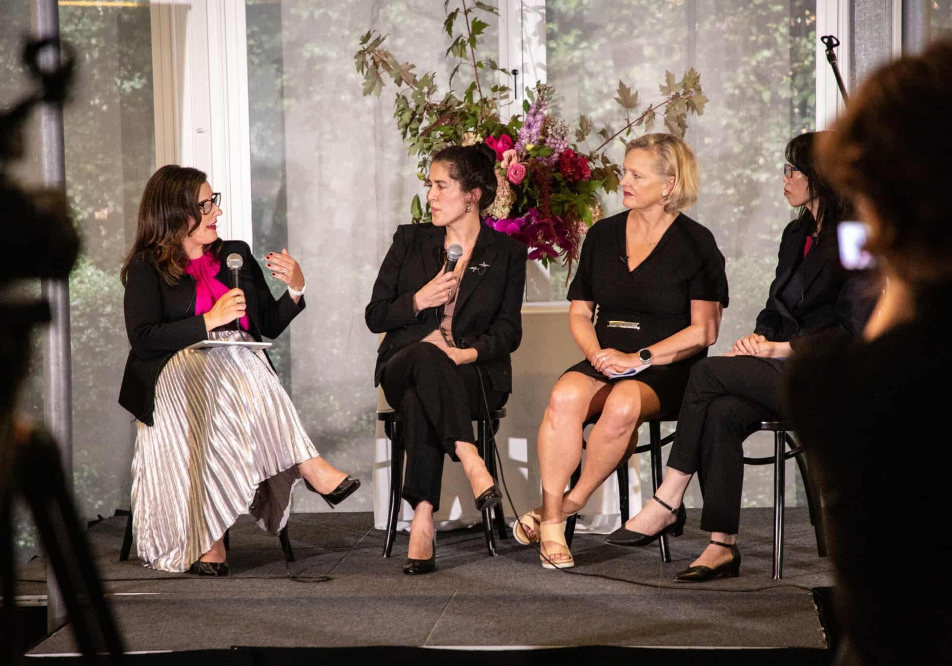 Viv Nguyen, Nola Karapanagiotidis, Corinne Proske and Fotini Kypraios seated on stage at the HACCI International Women's Day panel event, 2022.
